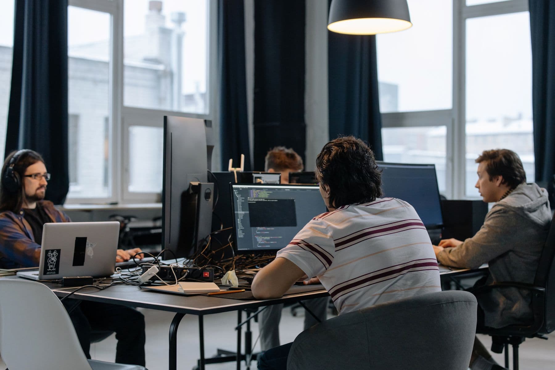 International software team working together in a modern office